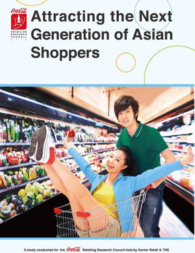 a person pushing another in a shopping cart in a grocery store