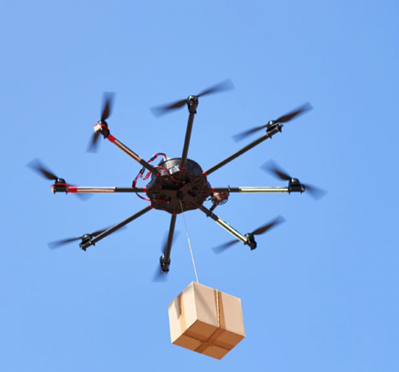 Delivery drone flying while carrying a package suspender by tether